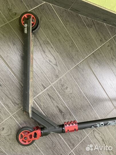 Трюковой самокат Оxelo