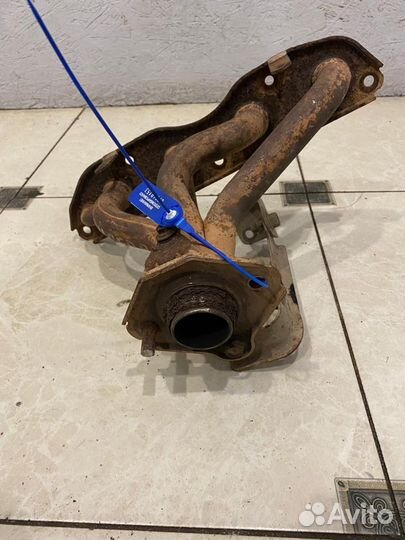 Выпускной коллектор Mitsubishi Lancer 9