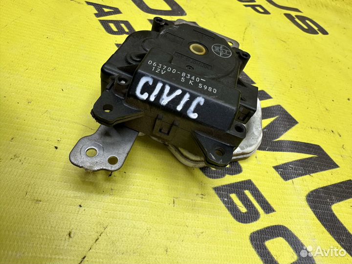 Моторчик заслонки отопителя Honda Civic