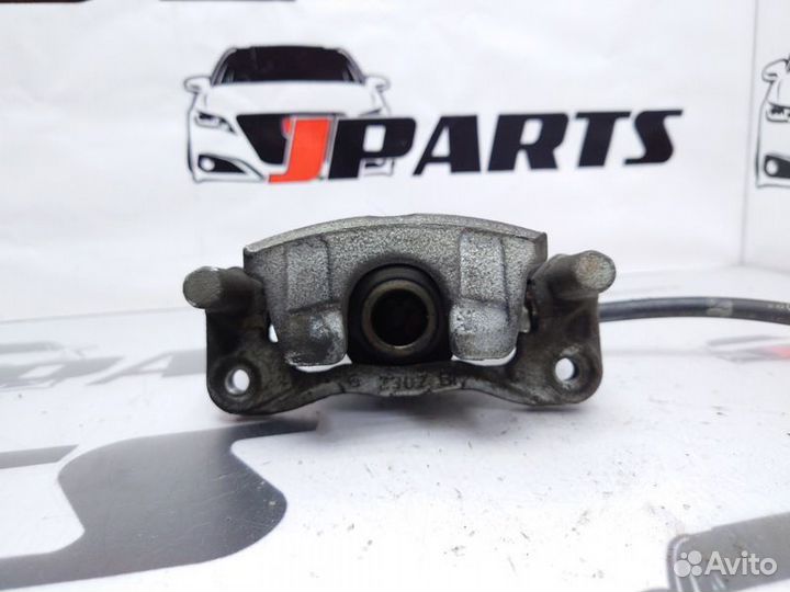 Суппорт задний правый Mitsubishi Lancer 10