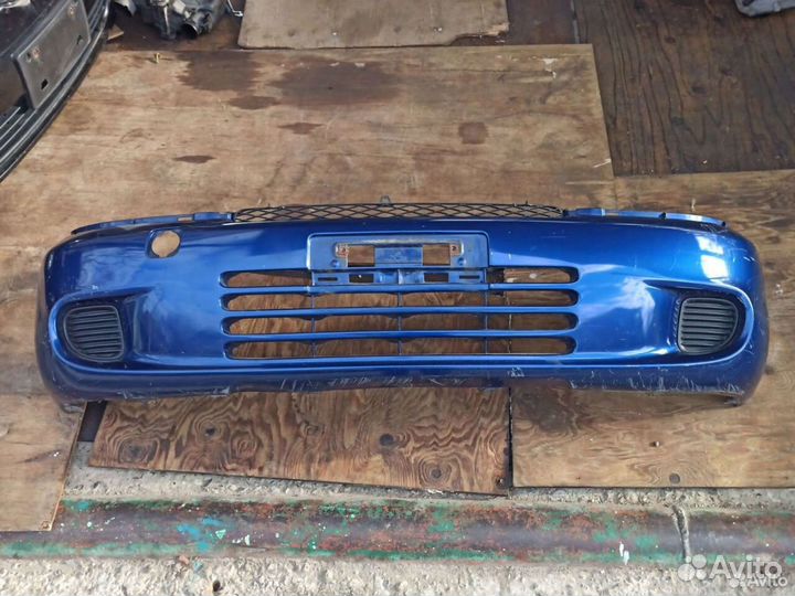 Бампер Toyota Funcargo дорестайлинг