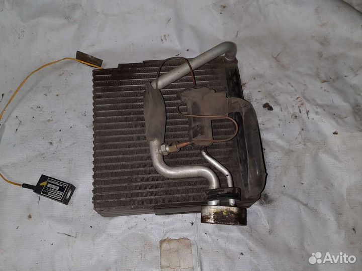 Радиатор кондиционера Mitsubishi carisma