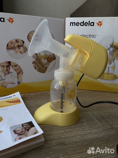 Молокоотсос medela электрический