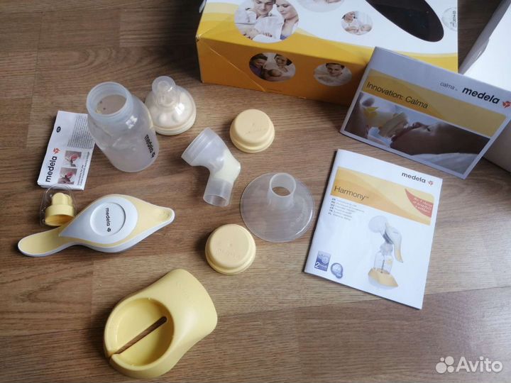 Молокоотсос ручной medela + соска medela calma