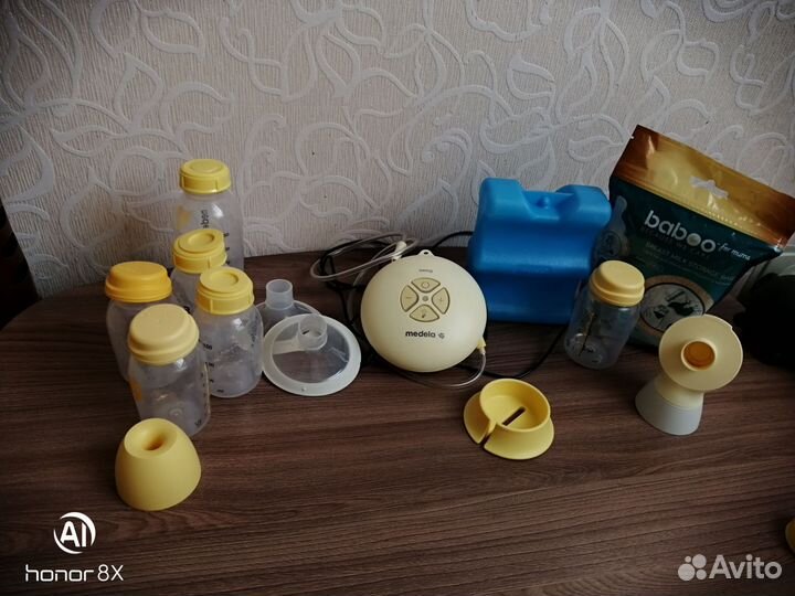 Молокоотсос medela электрический