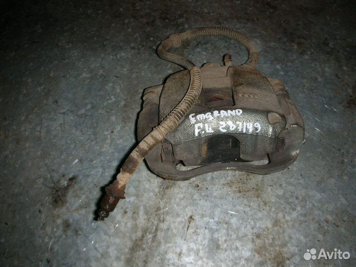 Суппорт передний левый Geely emgrand 2008