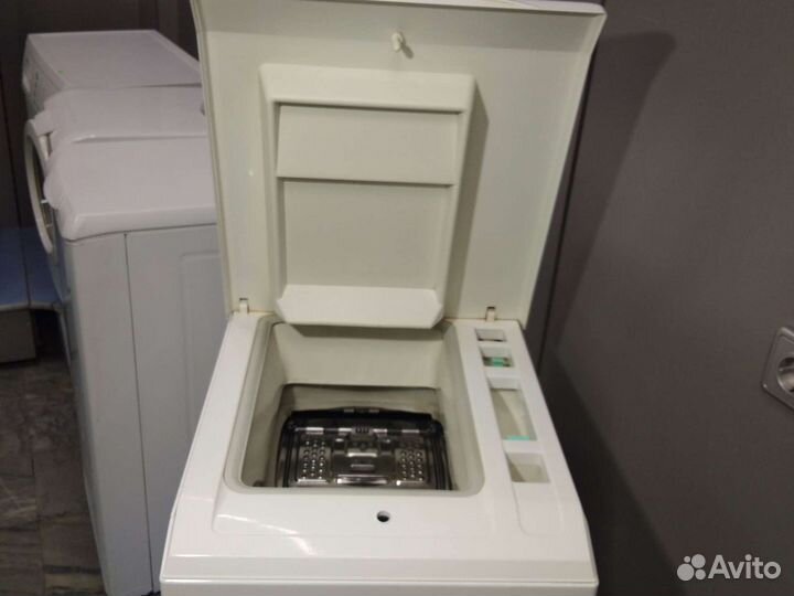 Стиральная машина с вертикальной загрузкой