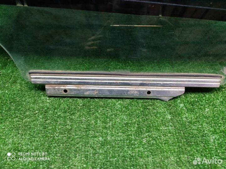 Стекло двери заднее правое Toyota Corolla 150