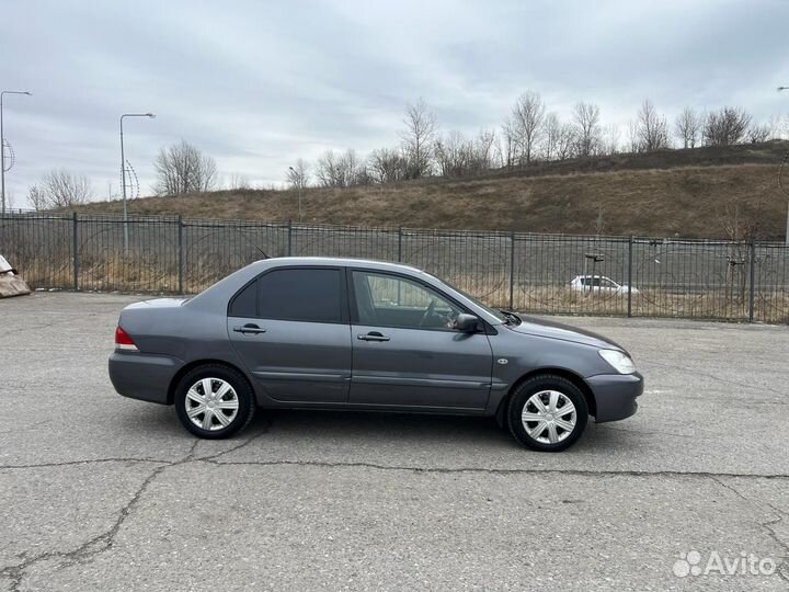 Mitsubishi Lancer 1.6 МТ, 2006, 180 000 км