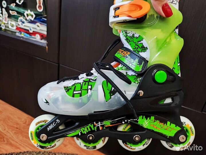 Роликовые коньки