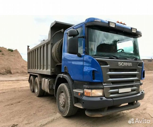 Водитель самосвала Scania