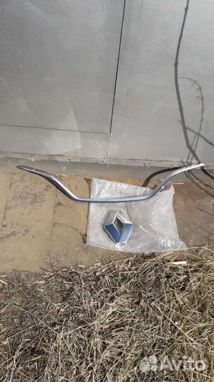 Эмблема птф Рено каптюр