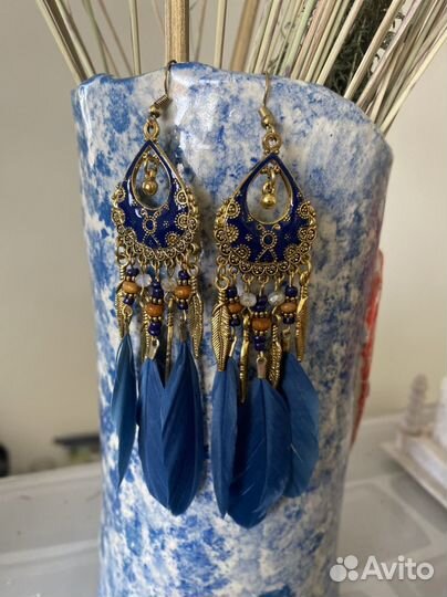 Серьги с перьями