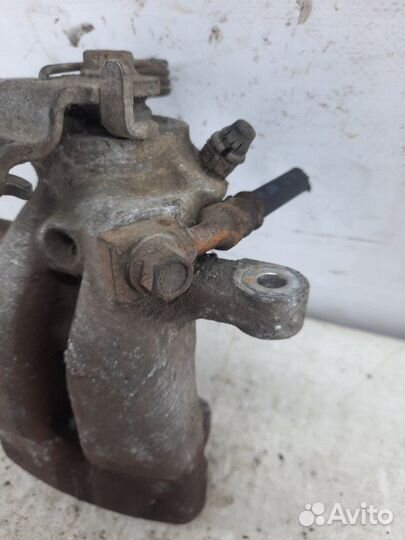 Суппорт тормозной задний правый Opel Astra хэтчбэк