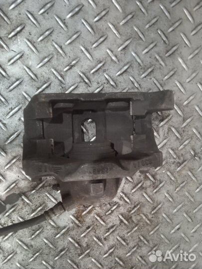 Суппорт тормозной передний правый Renault Scenic 1