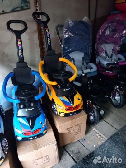 Машинка каталка с ручкой управления