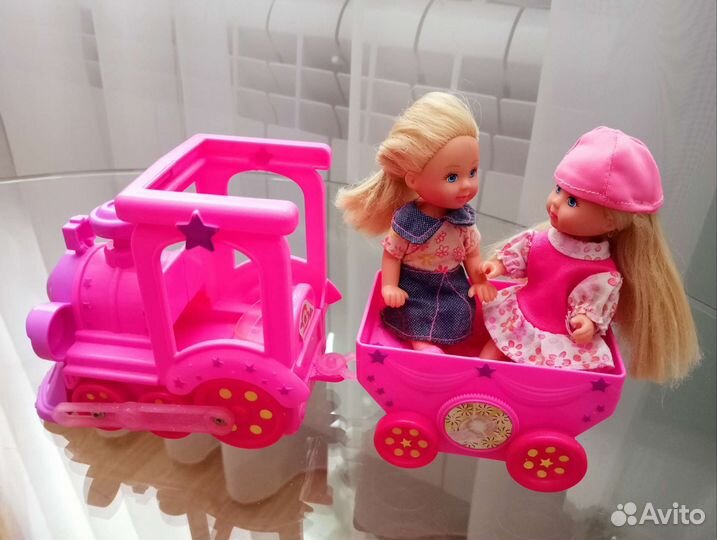 Паровозик с куклами