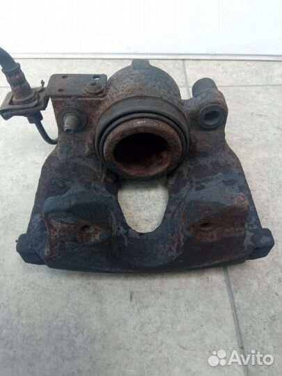 Суппорт тормозной передний левый Renault Laguna 2