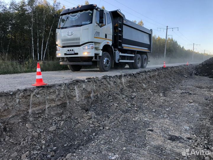Водитель самосвала