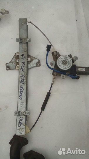 Стеклоподъемик задний левый Шевроле Лачетти