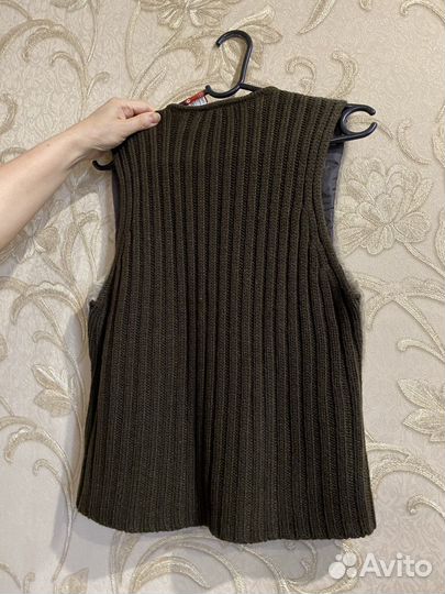 Жилетки меховые женские