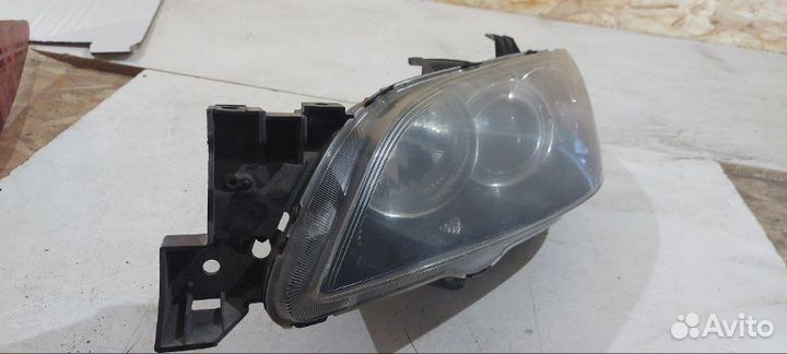Фара галогеновая передняя левая Mazda Mazda3 BK