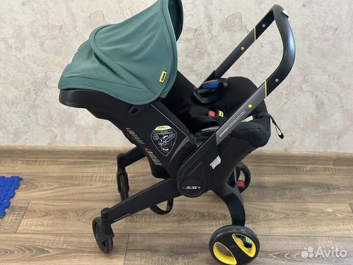 Коляска doona с базой isofix