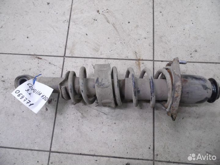 Амортизатор задний левый Toyota Corolla E12 2001-2