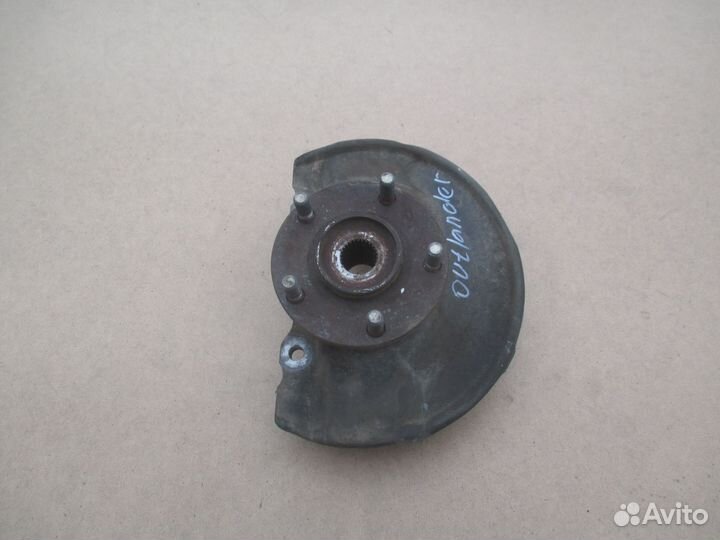 Кулак поворотный передний Mitsubishi Outlander