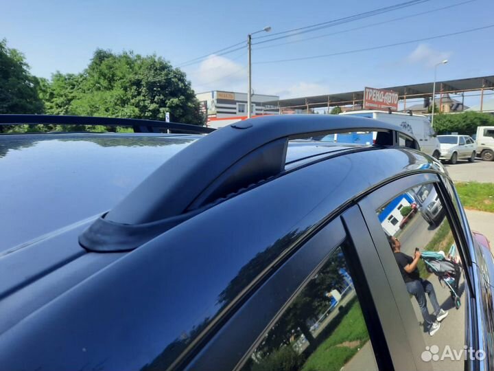 Рейлинги продольные на крышу Toyota RAV4 (40)