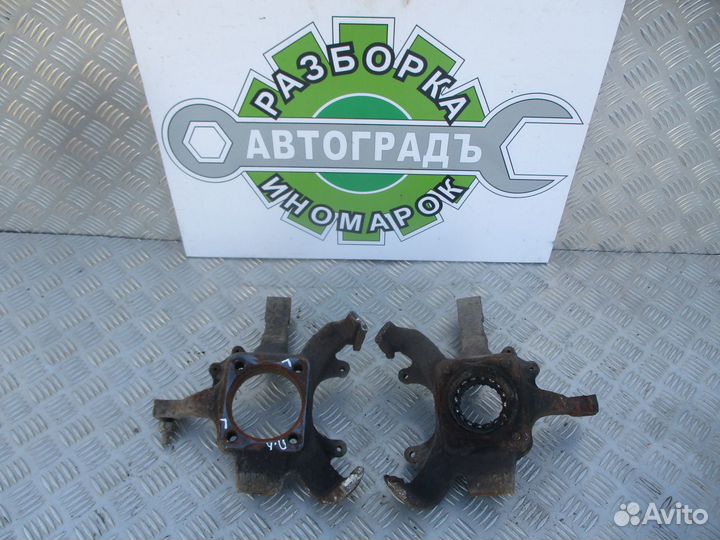 Кулак поворотный передний Dodge Caravan 2000г