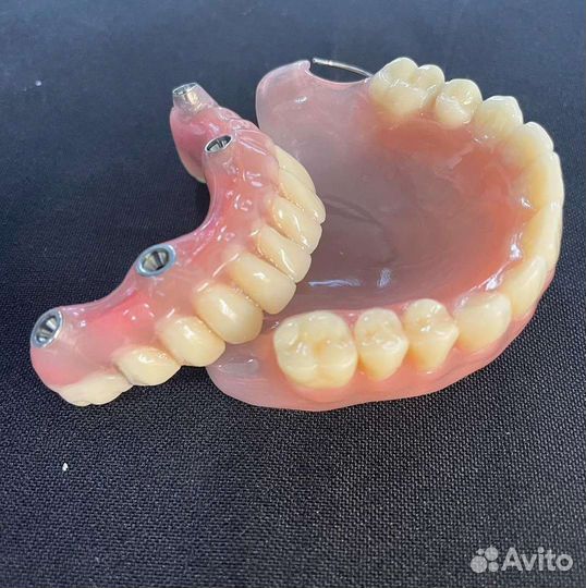 Зубной техник