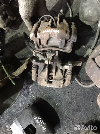 Суппорт задний Фольксваген