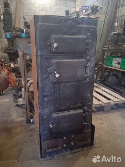 Котел твердотоплевный кчм