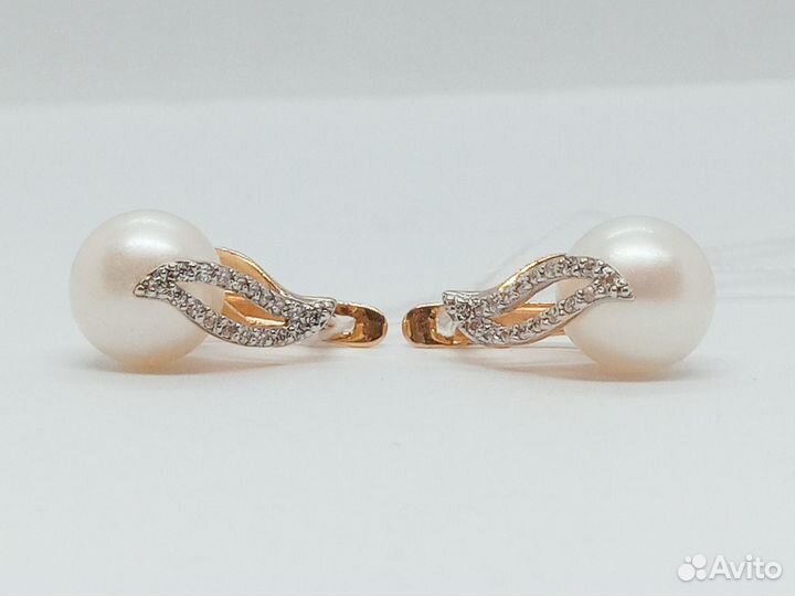 Золотые серьги с камнем