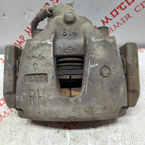 Суппорт тормозной передний правый Mazda 3 BL