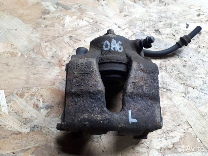 Суппорт передний левый Opel Astra G 1998-2005