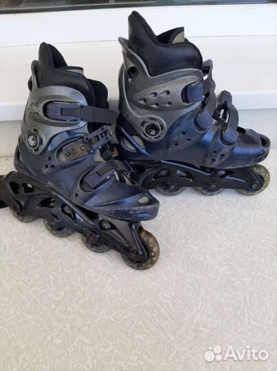 Роликовые коньки