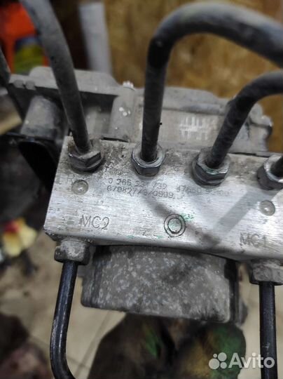 Блок ABS Nissan note e11