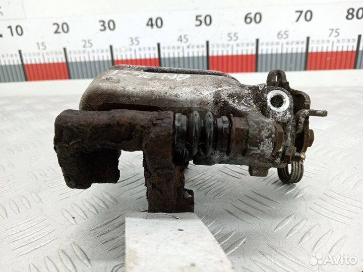 Суппорт задний правый для Opel Astra G 93176081