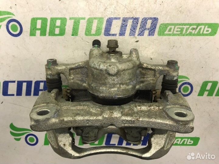 Суппорт тормозной передний левый Mazda 3 BP PE
