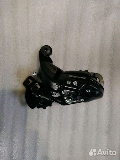 Переключатель задний Shimano Tourney 6-7 ск