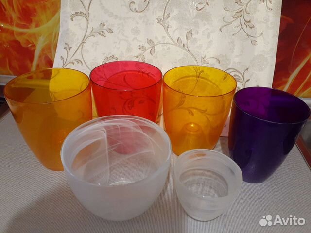 Горшки и лейка для цветов