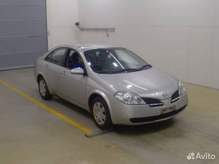 Суппорт тормозной задний правый Nissan Primera