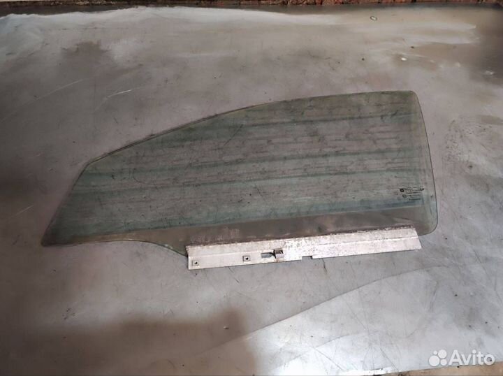Стекло двери передней левой Opel Astra G 1999