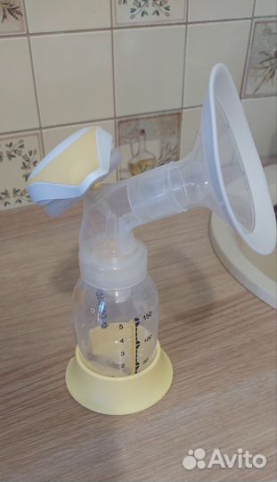 Молокоотсос medela ручной
