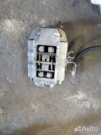 Суппорт тормозной задний левый Porsche Cayenne 955