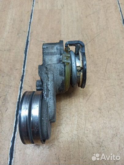 Натяжной ролик приводного ремня Opel Astra H