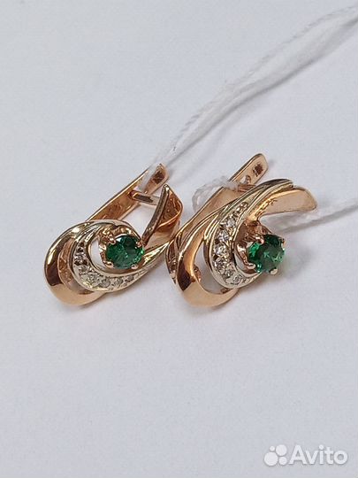 Золотые серьги с камнем