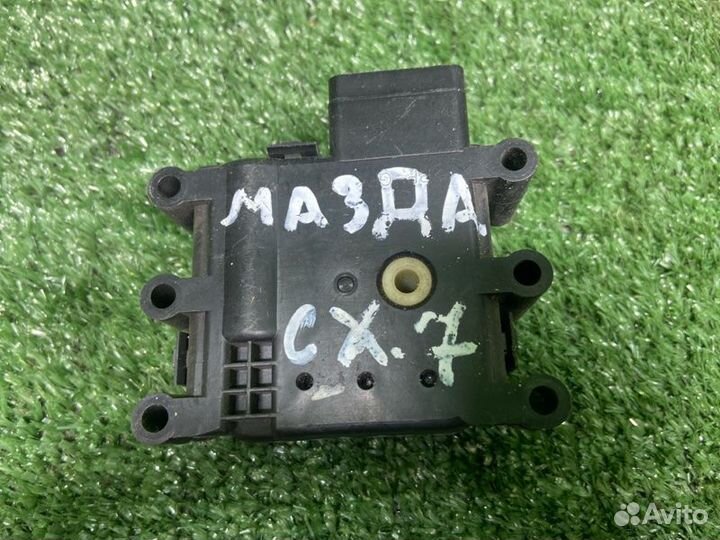 Моторчик заслонки печки Mazda Сх7